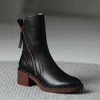 Valorine™ | Black leather boots with a comfortable heel, elegant and timeless.